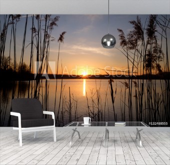 Bild på Sunset at Annone Lake